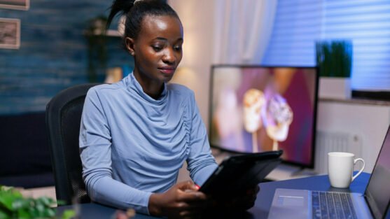 Afro woman working remote